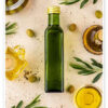Green and black olives with a bottle of olive oil